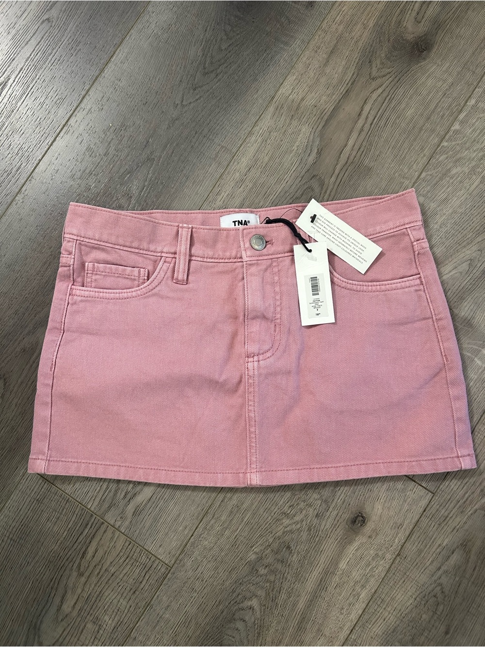 TNA Soft Pink Denim Mini Skirt